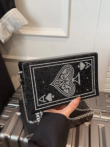 Pochette de soirée en strass avec motif As de Pique et bandoulière en chaîne argentée