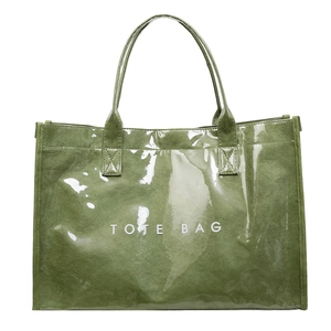 Minimalist green waterproof tote bag with white text print and dual handles