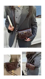 Macro detail of dark brown glossy leather small square bag with decorative double buckles