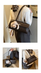 Close-up of dark brown quilted shoulder bag with silver twist lock and bunny charm