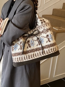 Vintage floral plush tote bag with leather bottom and bow detail for women commuting