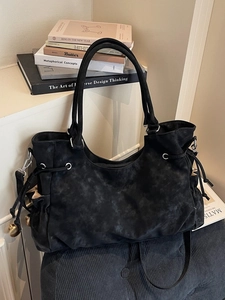 Vintage black marble pattern tote bag with side drawstrings and silver hardware