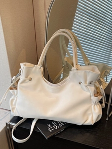 White pleated faux leather tote bag with drawstring detail and detachable shoulder strap