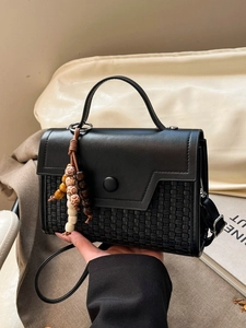 Retro black leather handbag with woven texture and bohemian wooden bead pendant charm