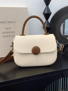 Retro canvas and brown leather handbag with round button detail and top handle