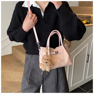 Pink crossbody tote bag for women featuring a cute brown puppy plush charm and metal lock