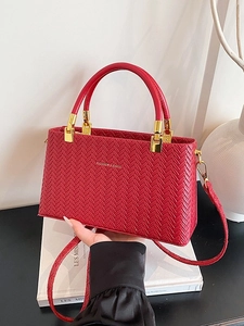 Chic red woven texture handbag with gold hardware and dual handles for women