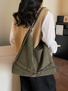Olive green large suede hobo tote bag with buckle strap detail for daily commute