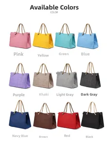 Matrix display of large capacity canvas tote bags in twelve assorted vibrant colors