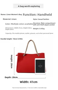 Detail view of large red linen tote bag with iPad mini for size reference and scale