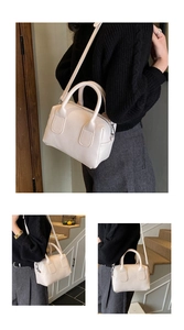 Litchi texture off-white baguette bag with comfortable handles and detachable strap