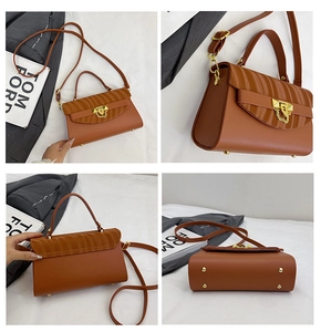 Detailed views of brown PU leather handbag with gold chain, latch, and wave pleats