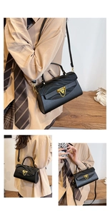 Black crossbody bag showing shoulder and handheld styles with gold wave detail