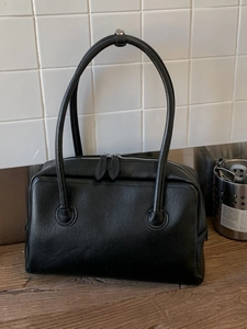 Minimalist black faux leather large capacity Boston bag with cylindrical shoulder straps