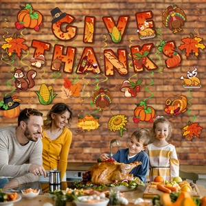 Thanksgiving party decorations set with Give Thanks banner and autumn hanging swirls