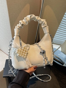 Chic pleated off-white shoulder bag with pearl heart charm and metallic chain strap