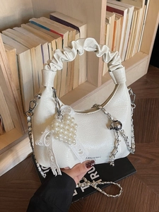 Chic beige pleated crescent handbag with cracked PU texture and pearl heart charm