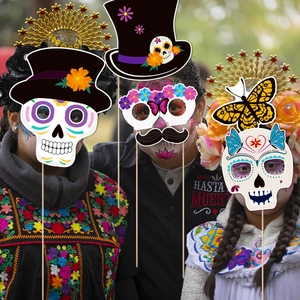 Mexican Day of the Dead photo booth props with colorful skull mask and flower crown set