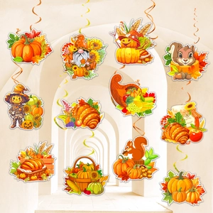 Close-up of Thanksgiving hanging swirl decorations featuring pumpkins and harvest gnomes