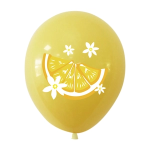 Close-up of a yellow lemon party balloon featuring citrus slice and small white flowers