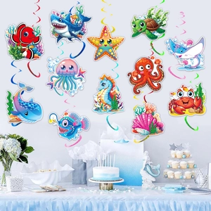 Ocean theme party hanging swirls with cartoon sea creature cards and spiral decor