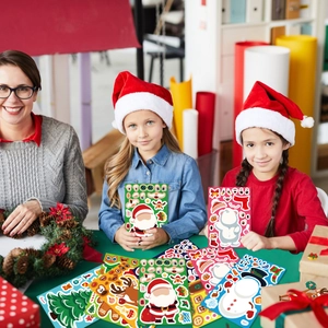 Kids Christmas DIY sticker set featuring Santa and Reindeer for holiday party favors