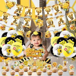 Bee theme birthday party set with balloons, happy birthday banner and cake toppers