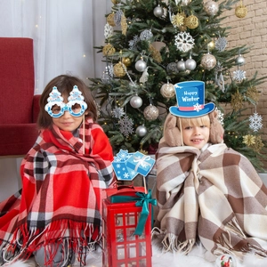Winter Christmas photo booth props kit featuring snowflakes and Happy Winter hat for kids