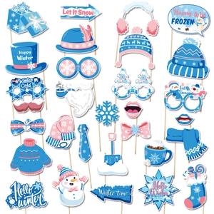 Winter Christmas photo booth props kit with snowmen hats and festive party accessories