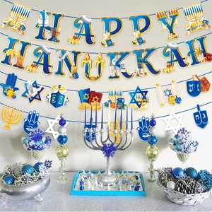 Happy Hanukkah banner with blue and gold letters, menorah, and dreidel decorations