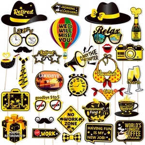 Variety of retirement party photo props featuring yellow and black paper cutout designs