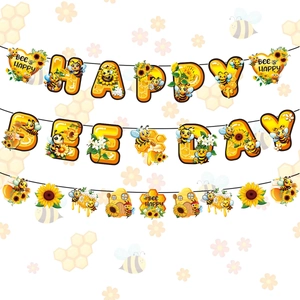 Bee themed birthday party decoration kit with Happy Bee Day banner and floral pendants