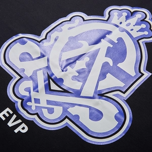 Oversized black cotton T-shirt featuring purple crown graphic and EVP letter print