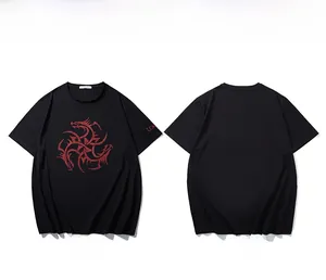 Detail of oversized black t-shirt featuring a red dragon totem and screen printing art