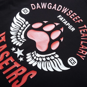 Streetwear oversized black T-shirt featuring a red claw and white wing graphic print