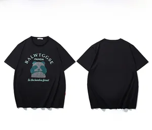 Detail of black T-shirt featuring a shimmering rhinestone panda and brand print