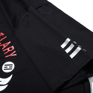Oversized black cotton T-shirt featuring red ARY print and reflective stripes on sleeves