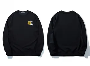 Detailed front and back view of a black crewneck sweatshirt with lion crown print
