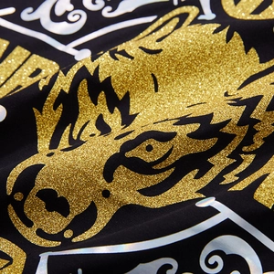 T-shirt noir oversize en coton avec imprimé tigre doré scintillant et détails argentés
