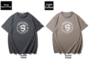 Flat lay of cotton t-shirts in grey and tan with dragon graphic and letter printing