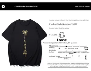 Detail of black cotton T-shirt featuring golden dragon print and streetwear text