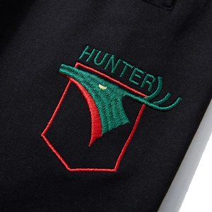 Men's loose black knit shorts featuring premium green Hunter and eagle embroidery detail