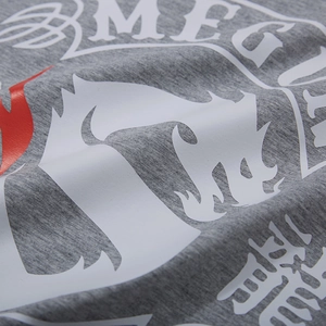 Grey oversized cotton t-shirt featuring detailed dragon print and graphic embroidery