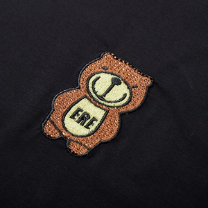 Oversized black cotton T-shirt featuring a detailed bear embroidery with sparkling rhinestones