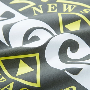 Deep grey oversized cotton T-shirt featuring yellow NEWS print and street style graphics