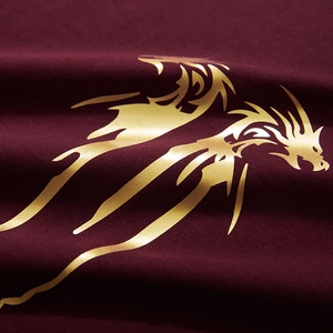 Burgundy loose cotton t-shirt featuring metallic gold dragon print for men