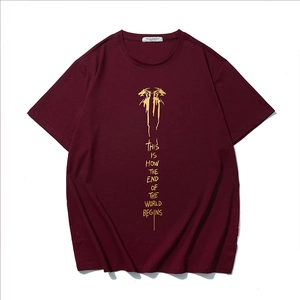 Men's oversized burgundy T-shirt with gold dragon graphic and foil print lettering