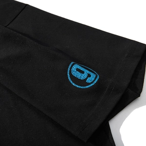 Oversized black cotton T-shirt featuring a glittery blue circular graphic print detail