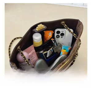 Spacious interior of the large tote bag showing compartments for daily essentials