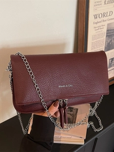 French style burgundy pebble leather chain bag with silver hardware and logo detail